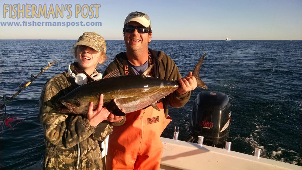 Logan and Capt. Justin Ragsdale with a citation 22 lb. blackfin tuna Logan landed while trolling southwest of the Trawler buoy off Beaufort Inlet.