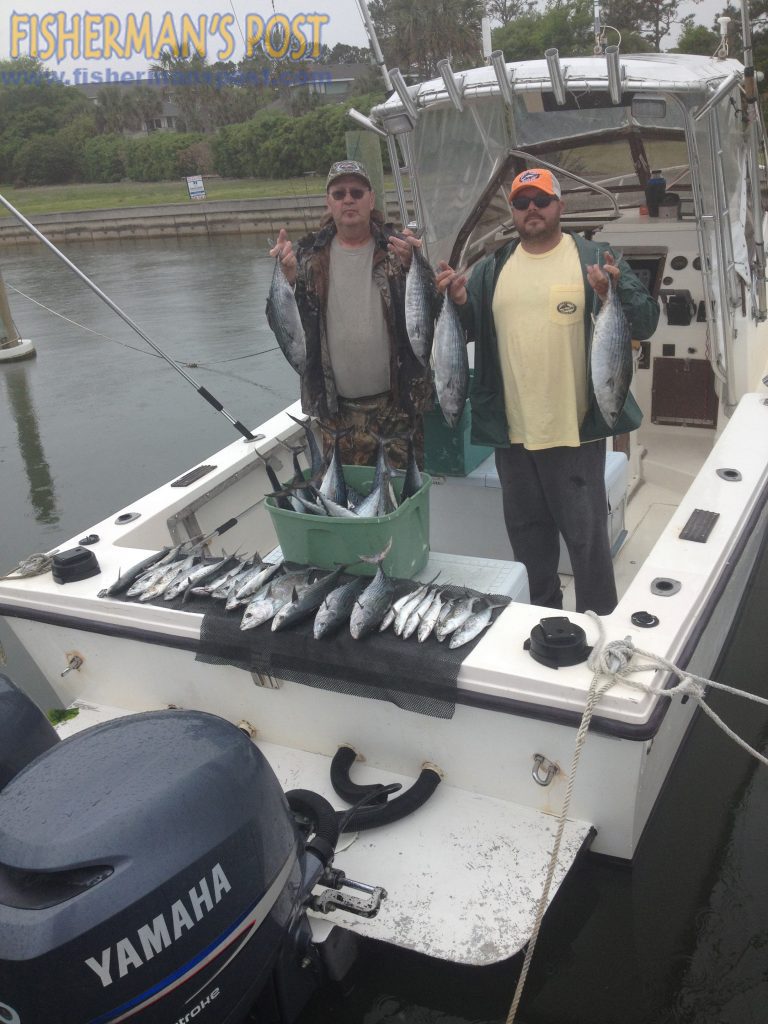 Dwayne Gray and John Cranford, of Winston-Salem, NC, with Atlantic bonito, false albacore, and spanish mackerel they hooked just off Carolina Beach while fishing with Capt. Rod Bierstedt of OnMyWay Charters.