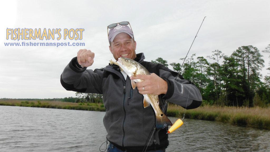 Dean Franks, of Tampa, FL, with a  puppy drum he caught on a soft plastic while casting to a Neuse River shoreline with Capt. Dave Stewart of Knee Deep Custom Charters.