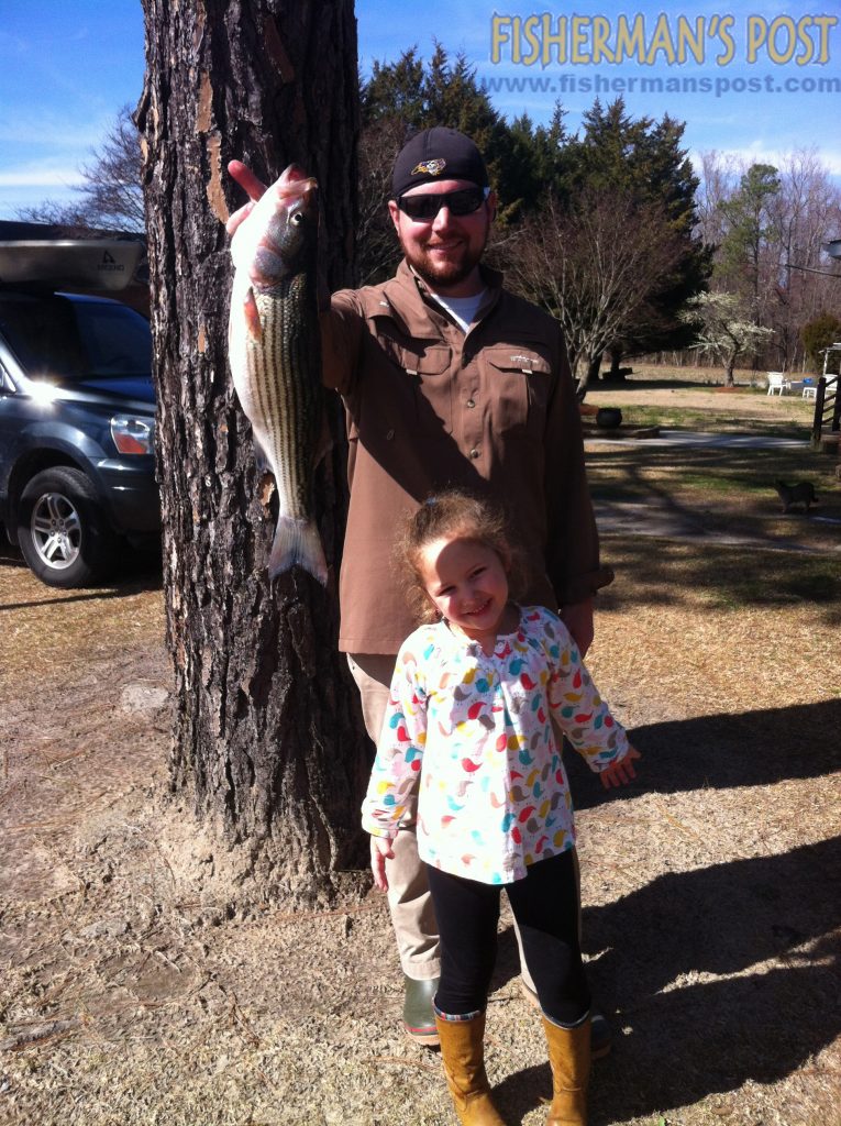 John and Zoey Bowling with a 20" striped bass that fell for a Gulp minnow in the Tar River near Washington.
