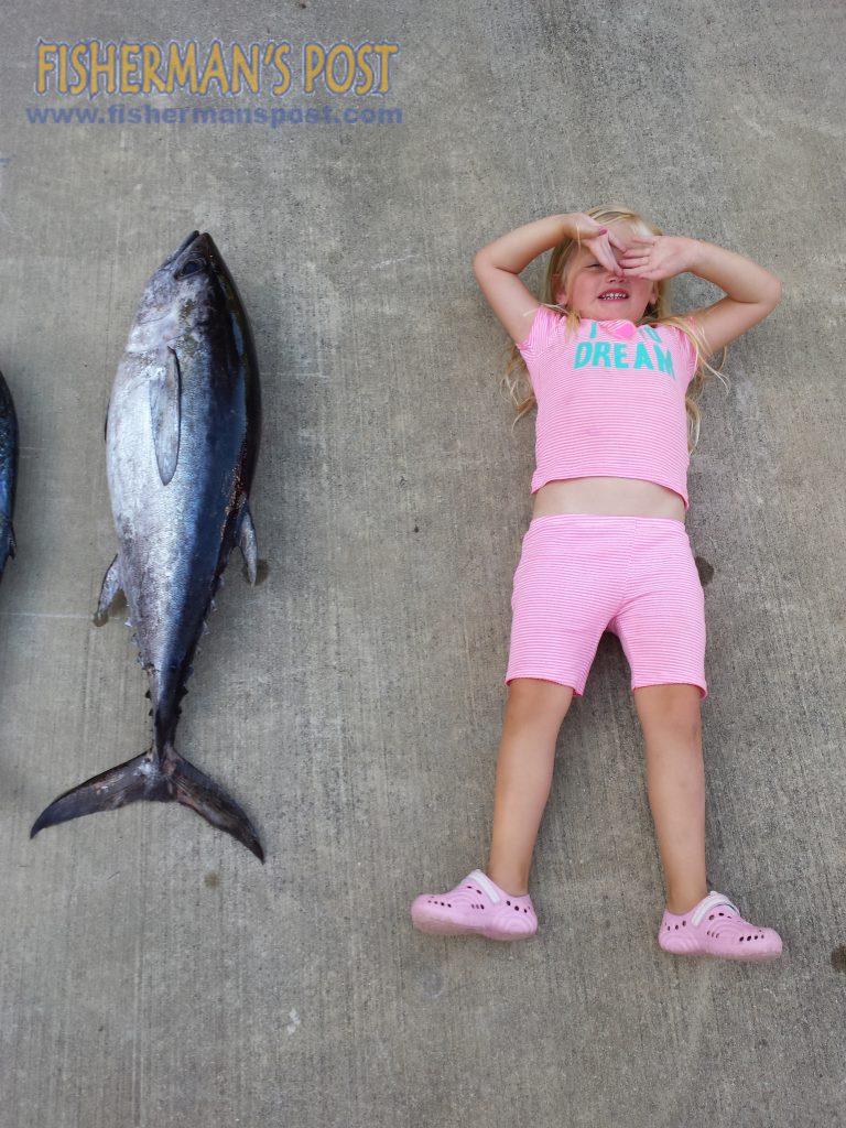 Holden Mizell (age 3) and a 26 lb. blackfin tuna that struck a live menhaden at the Shark Hole.