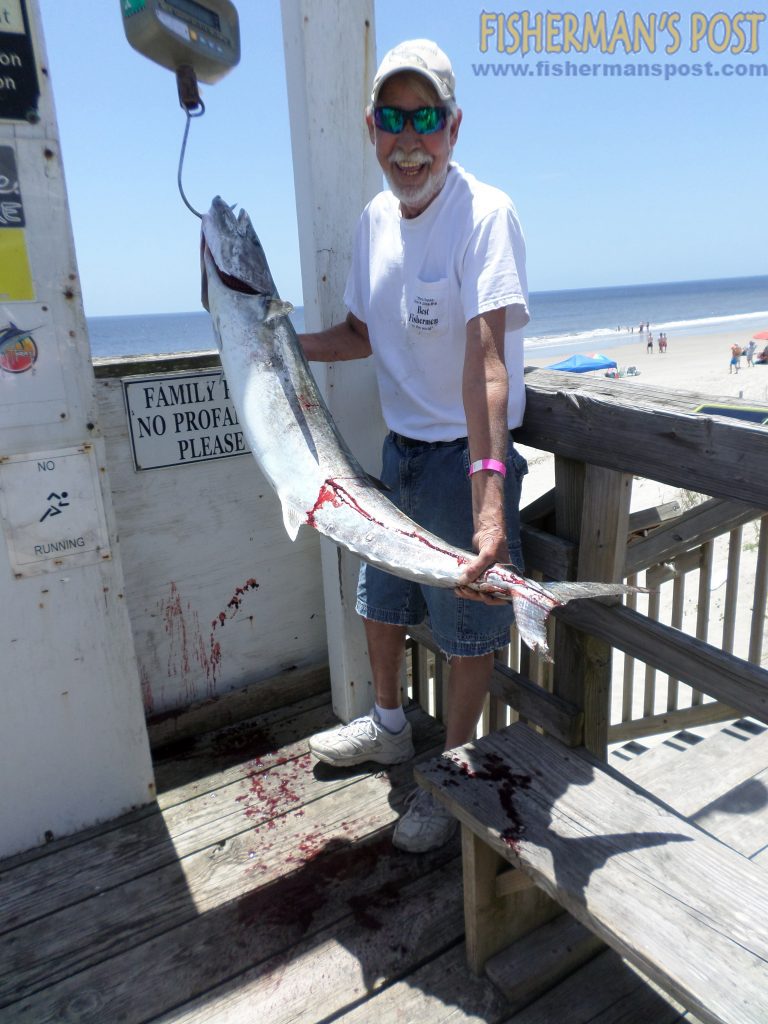 Troy Harwell, of Kannapolis, NC, with the 37 lb., 14 oz. king mackerel that was the largest fish weighed in the Oak Island Parks and Rec Pier Tournament. He landed the big king off the end of Oak Island Pier after it struck a live bluefish.