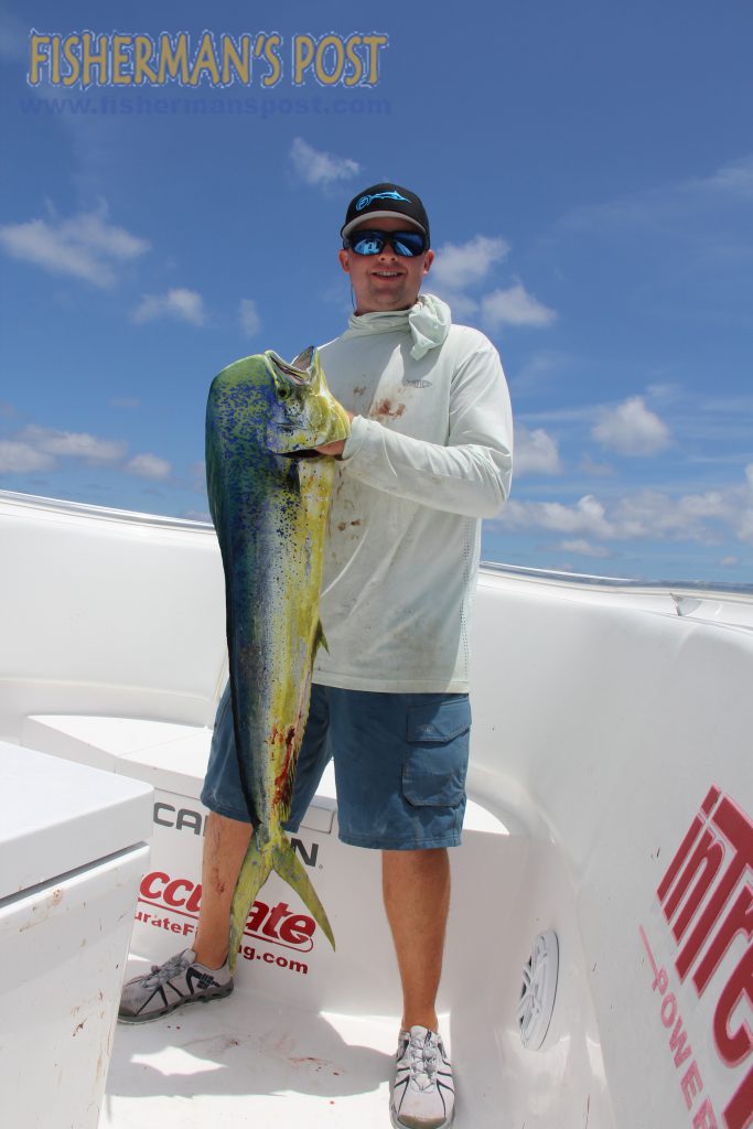 Crockett Henderson, of Cape Carteret's Liquid Fire Fishing Team, with a dolphin that struck a trolled ballyhoo in 120' of water off Beaufort Inlet.