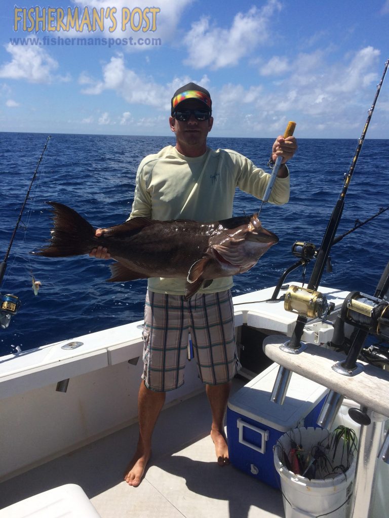 Chad Trader with a 20.6 lb. scamp grouper that inhaled a live pinfish at some bottom structure 40 miles off Wrightsville Beach while he was fishing with Dan Spencer and Brent Trader.