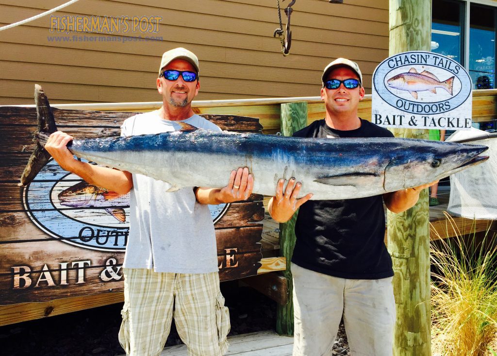 Nicholas Gibson and Wayne Hardee, of Greenville, NC, with a 69 lb. wahoo they landed while trolling off Beaufort Inlet near the Big Rock. Weighed in at Chasin' Tails Outdoors.