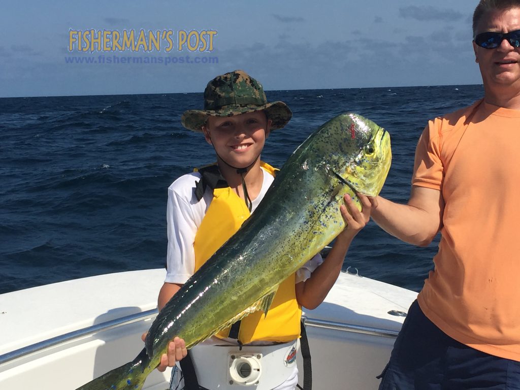 Walt Bounds, of Laurinburg, NC, with his first dolphin, a 12.35 lb. fish that struck a cigar minnow at Yaupon Reef during the Jr. Jolly Mon Tournament.