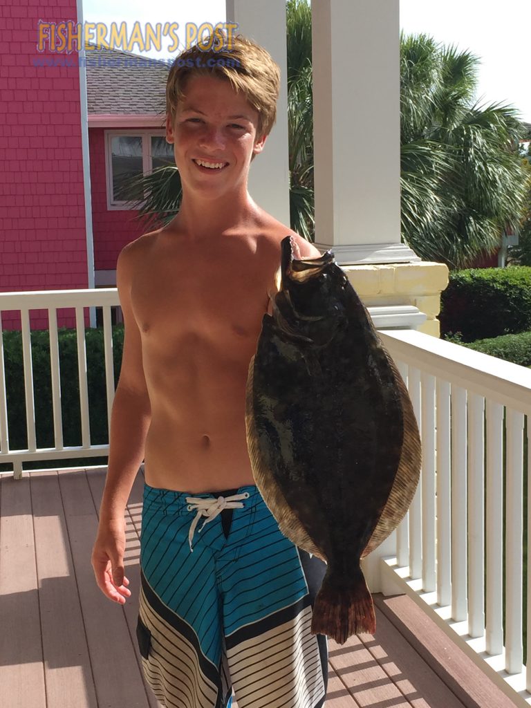 Harper Scott with a 23" flounder that struck a live menhaden in the ICW near Wrightsville Beach.