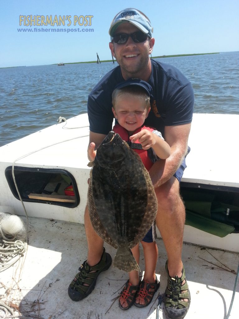 Caleb Lee (age 3), of Fayetteville, NC, landed his first flounder while fishing the Southport waterfront with his father Stephen. The 20" fish fell for a live shrimp on a Carolina rig.