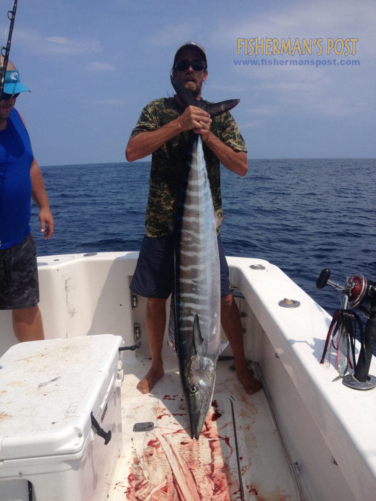 Scott Wallen, of Wilmington, with a 70 lb. wahoo that struck a ballyhoo under a Blue Water Candy JAG while he was trolling out of Wrightsville Beach near the Same Ol' Hole with Capt. Erik Scheeler on the "Wide Open."