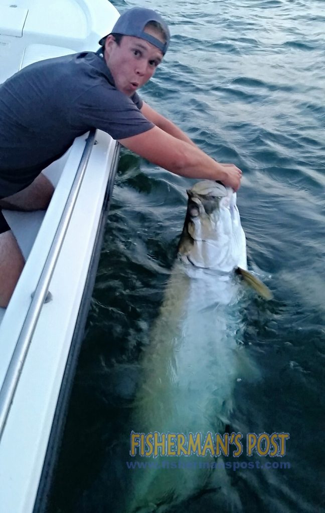 Justin Whitley, of Wilmington, with a 90 lb. tarpon that bit a live mullet on the bottom in the ocean near Carolina Beach while he was fishing with Capt. Christian Wolfe of Seahawk Inshore Fishing Charters.