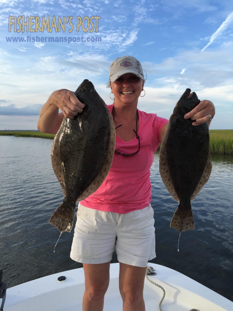 Patty Miller, of Southport, with 4.5 and 4 lb. flounder she caught near Bald Head Island while fishing with her husband Charlie.