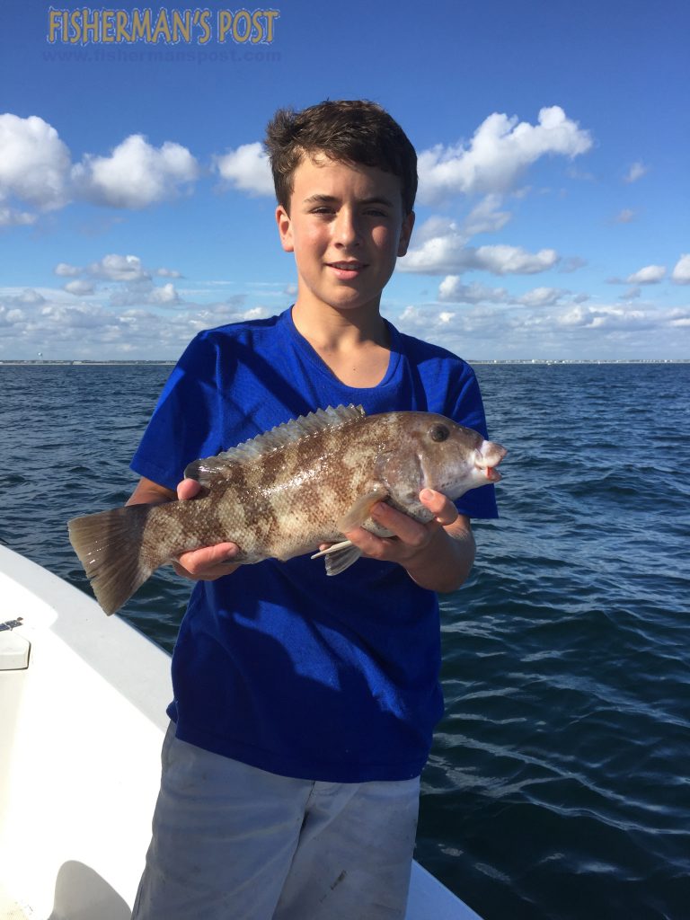 Blake Boyd, of Hampstead, NC, with a tautog that bit a Gulp bait at AR-360 off Topsail Beach.